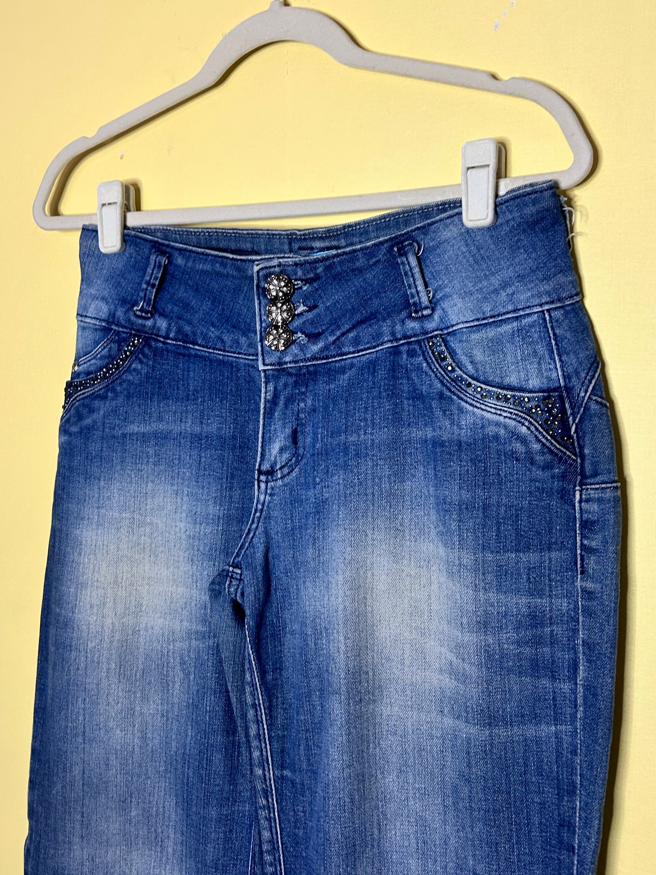 Calça skinny cintura baixa pedraria — foto 3